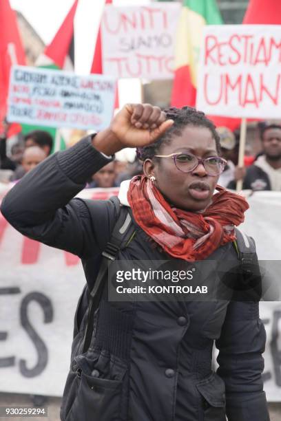 Woman during the demonstration that took place in Naples against racism and for Idy Diene, a Senegalese street vendor killed in Florence.
