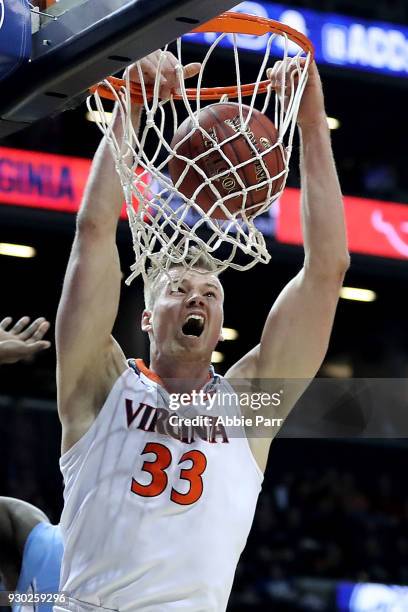 Jack Salt of the Virginia Cavaliers dunks the ball in the second half against the North Carolina Tar Heels during the championship game of the 2018...