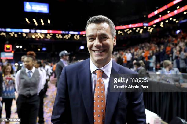 Head coach Tony Bennett of the Virginia Cavaliers exits the court after defeating the North Carolina Tar Heels 71-63 during the championship game of...