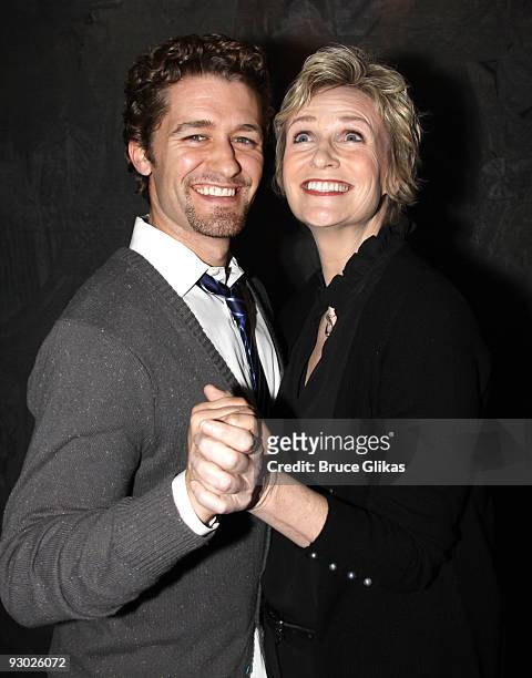Matthew Morrison and Jane Lynch pose backstage at "Love, Loss and What I Wore" at The Westside Theater on November 12, 2009 in New York City.