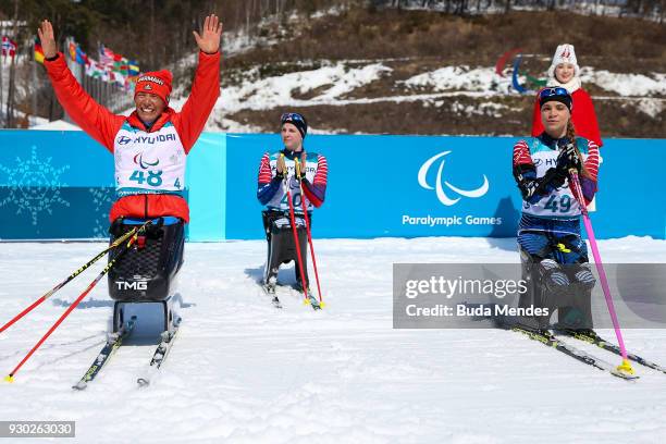Andrea Eskau of the Germany celebrates after crossing the finish line in second place in the Women's Cross Country 12km - Sitting event at Alpensia...