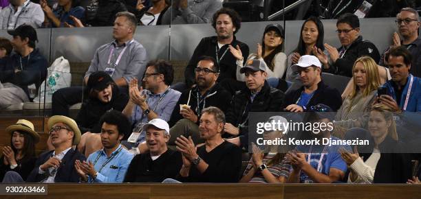 Oracle Co-founder Larry Ellison watches Roger Federer of Switzerland play Federico Delbonis of Argentina during Day 6 of the BNP Paribas Open on...