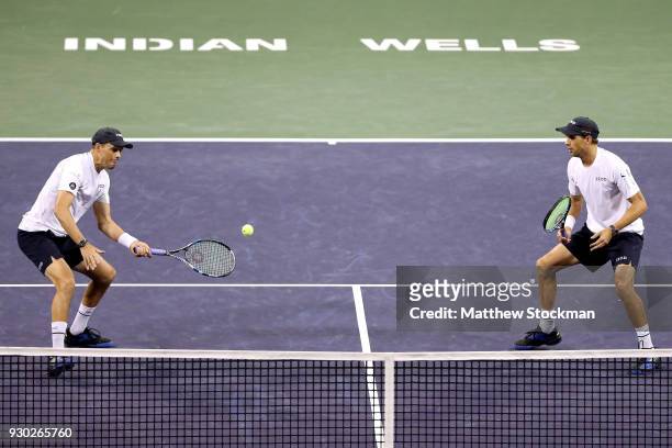 Mike Bryan and Bob Bryan play Alexander Zverev and Mischa Zverev of Germany during the BNP Paribas Open at the Indian Wells Tennis Garden on March...