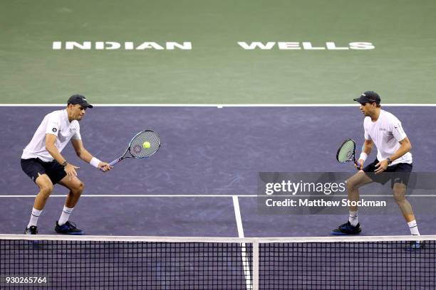 Mike Bryan and Bob Bryan play Alexander Zverev and Mischa Zverev of Germany during the BNP Paribas Open at the Indian Wells Tennis Garden on March...
