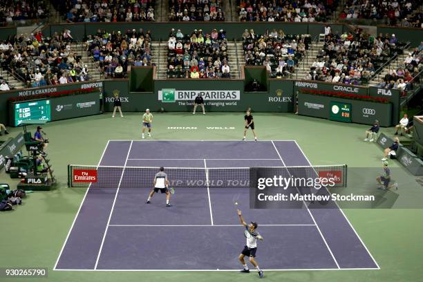 Bob Bryan and Mike Bryan play Alexander Zverev and Mischa Zverev of Germany during the BNP Paribas Open at the Indian Wells Tennis Garden on March...