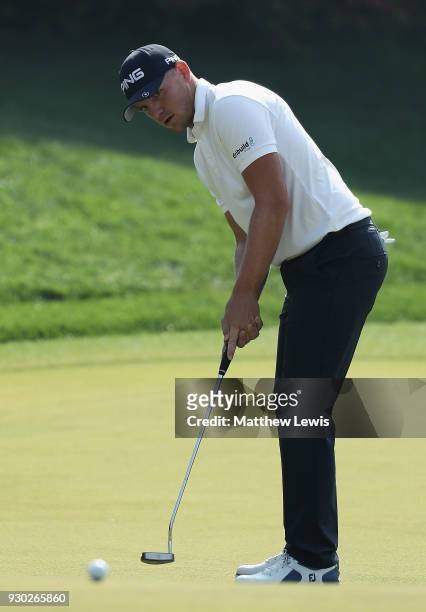 Matt Wallace of England makes a putt on the 3rd green during day four of the Hero Indian Open at Dlf Golf and Country Club on March 11, 2018 in New...