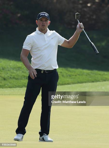 Matt Wallace of England reacts after nearly making a putt on the 3rd green during day four of the Hero Indian Open at Dlf Golf and Country Club on...
