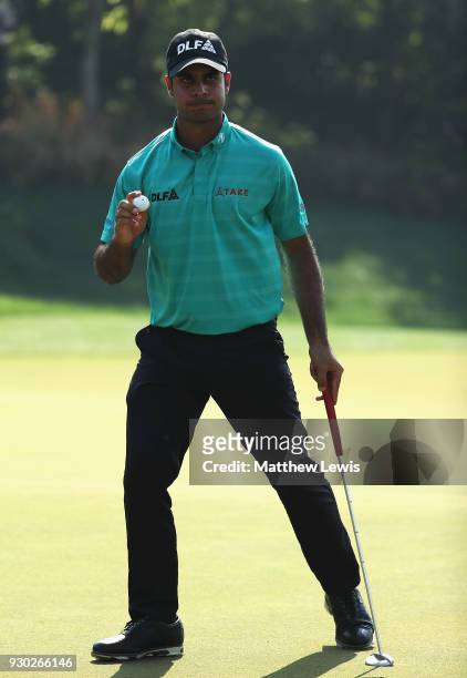 Shubhankar Sharma of India celebrates making a putt on the 3rd green during day four of the Hero Indian Open at Dlf Golf and Country Club on March...