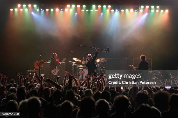 Singer Jeff Gutt , guitarist Dean DeLeo , bass player Robert DeLeo and drummer Eric Kretz of Stone Temple Pilots perform at Marquee Theatre on March...