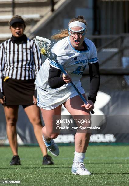 Johns Hopkins Mackenzie Heldberg moves up field during a women's college Lacrosse game between the Johns Hopkins Blue Jays and the Hofstra Pride on...