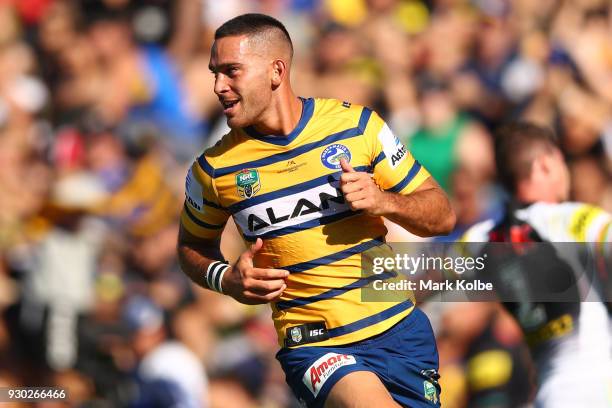 Corey Norman of the Eels celebrates after scoring a try during the round one NRL match between the Penrith Panthers and the Parramatta Eels at...