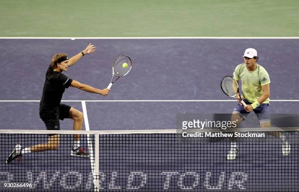 Alexander Zverev and Mischa Zverev of Germany play Mike Bryan and Bob Bryan during the BNP Paribas Open at the Indian Wells Tennis Garden on March...