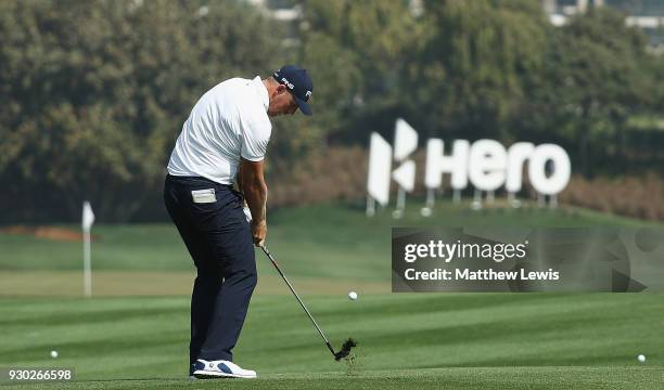 Matt Wallace of England plays his second shot from the 6th fairway during day four of the Hero Indian Open at Dlf Golf and Country Club on March 11,...