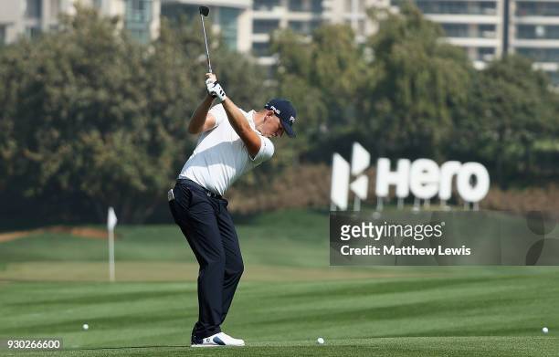 Matt Wallace of England plays his second shot from the 6th fairway during day four of the Hero Indian Open at Dlf Golf and Country Club on March 11,...