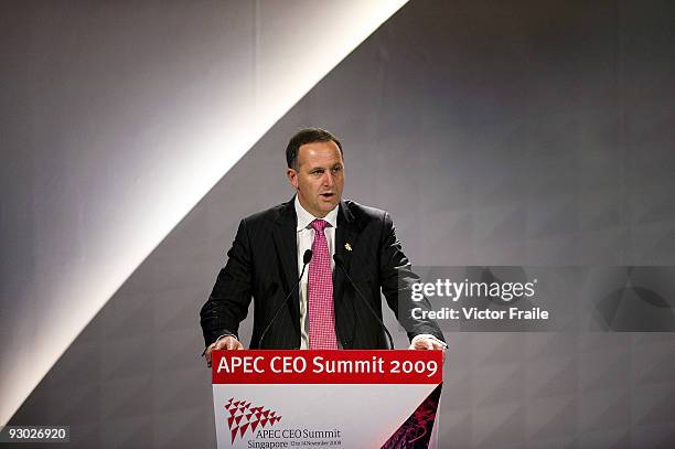 New Zealand's Prime Minister John Key attends the first day of the Asia Pacific Economic Cooperation CEO Summit at the Suntec Singapore International...