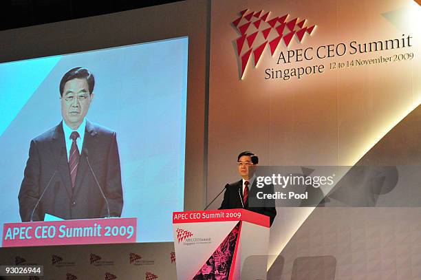 President of People's Republic of China Hu Jintao attends the first day of the Asia Pacific Economic Cooperation CEO Summit at the Suntec Singapore...