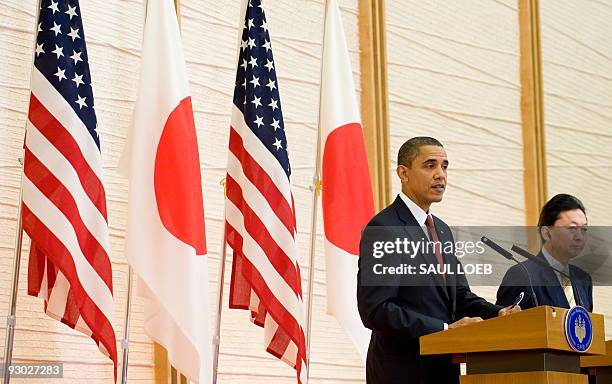 President Barack Obama speaks alongside Japanese Prime Minister Yukio Hatoyama during a press conference at Kantei, the Prime Minister's office and...