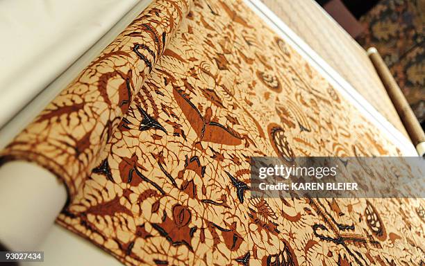 Batik patterned textiles collected by US President Barack Obama's mother, Ann Dunham, are displayed on August 5, 2009 at the Textile Museum in...