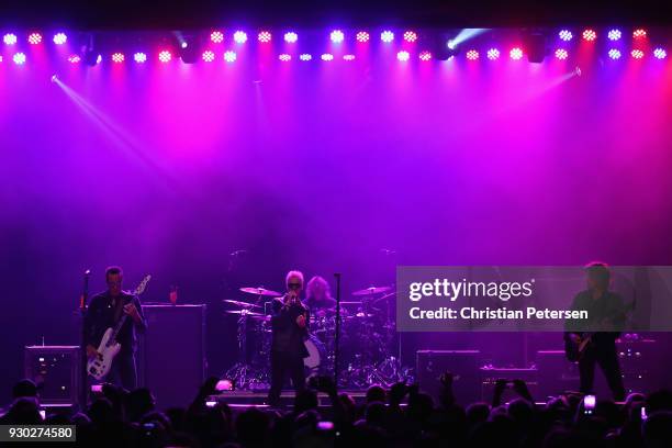 Singer Jeff Gutt , guitarist Dean DeLeo , bass player Robert DeLeo and drummer Eric Kretz of Stone Temple Pilots perform at Marquee Theatre on March...