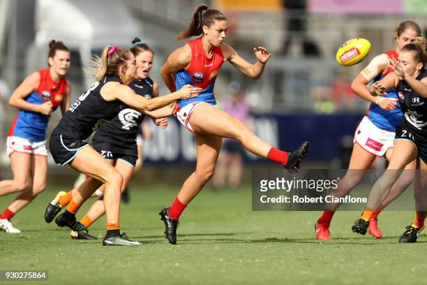 Claudia Whitfort of the Demons kicks the ball during the round six AFLW match between the Carlton Blues and the Melbourne Demons at Ikon Park on...
