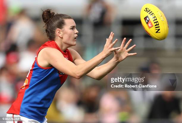 Lily Mithen of the Demons takes the ball during the round six AFLW match between the Carlton Blues and the Melbourne Demons at Ikon Park on March 11,...