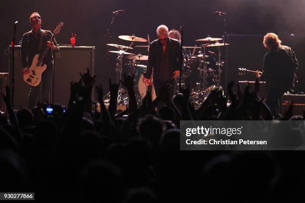 Singer Jeff Gutt , guitarist Dean DeLeo , bass player Robert DeLeo and drummer Eric Kretz of Stone Temple Pilots perform at Marquee Theatre on March...