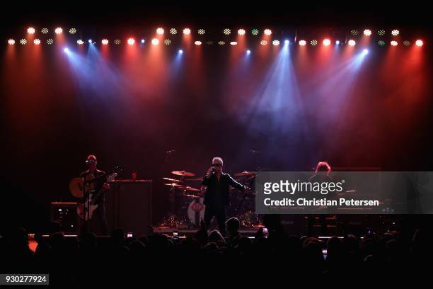 Singer Jeff Gutt , guitarist Dean DeLeo , bass player Robert DeLeo and drummer Eric Kretz of Stone Temple Pilots perform at Marquee Theatre on March...