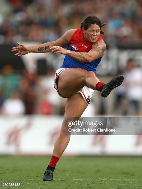 Richelle Cranston of the Demons kicks the ball during the round six AFLW match between the Carlton Blues and the Melbourne Demons at Ikon Park on...