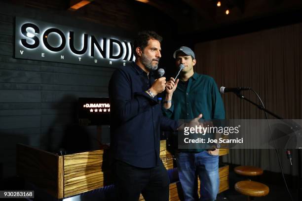 Guy Oseary and Ashton Kutcher speaks onstage during the Sound Ventures "The Party" at Hotel Van Zandt on March 10, 2018 in Austin, Texas.