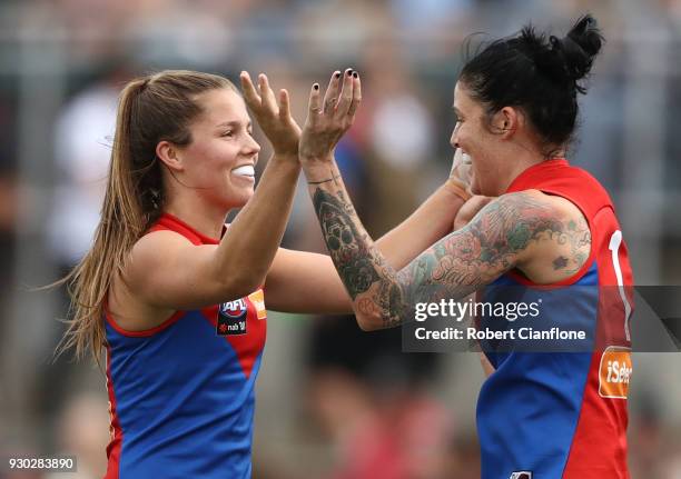 Kate Hore of the Demons celebrates after kicking a goal during the round six AFLW match between the Carlton Blues and the Melbourne Demons at Ikon...