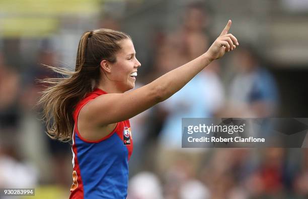 Kate Hore of the Demons celebrates after kicking a goal during the round six AFLW match between the Carlton Blues and the Melbourne Demons at Ikon...