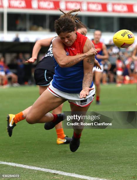 Richelle Cranston of the Demons handballs during the round six AFLW match between the Carlton Blues and the Melbourne Demons at Ikon Park on March...