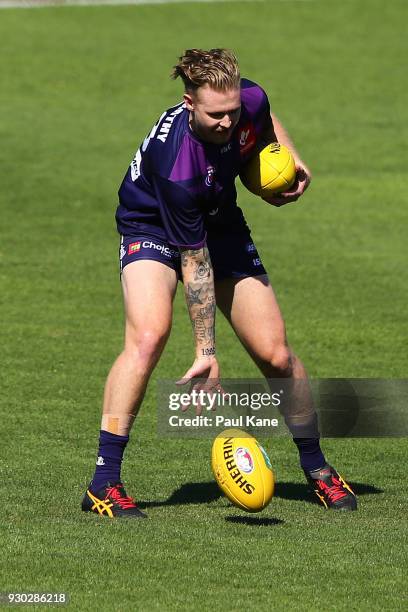 Cam McCarthy of the Dockers warms up before the JLT Community Series AFL match between the Fremantle Dockers and the West Coast Eagles at HBF Arena...