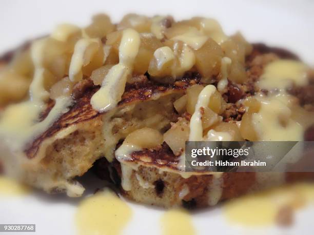 french toast with pecan, raisin, brioche and apple compote. - raisin toast stock pictures, royalty-free photos & images