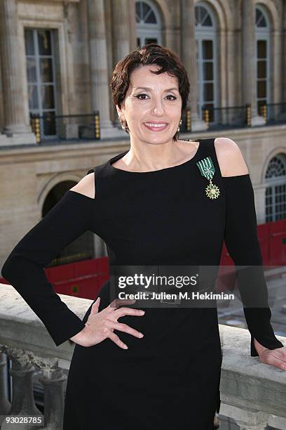 Singer Luz Casal poses after being decorated with the "Officier dans l'Ordre des Arts et des Lettres" by French Minister of Culture Frederic...