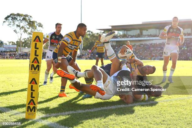 Bevan French of the Eels is tackled short of the tryline during the round one NRL match between the Penrith Panthers and the Parramatta Eels at...