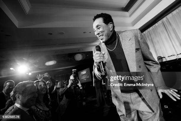 Smokey Robinson performs onstage at the Celebrity Fight Night's Founders Club Dinner on March 9, 2018 in Phoenix, Arizona.