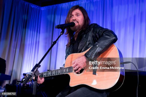 Billy Ray Cyrus performs onstage at the Celebrity Fight Night's Founders Club Dinner on March 9, 2018 in Phoenix, Arizona.