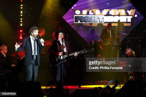 Kix Brooks and Ronnie Dunn of Brooks and Dunn perform onstage at Celebrity Fight Night XXIV on March 10, 2018 in Phoenix, Arizona.