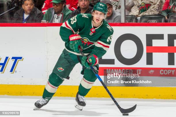 Tyler Ennis of the Minnesota Wild skates with the puck against the Detroit Red Wings during the game at the Xcel Energy Center on March 4, 2018 in...