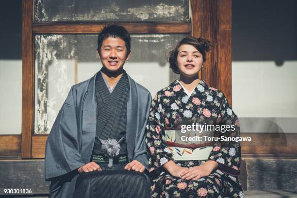 young couple in kamakura - kimono stock pictures, royalty-free photos & images