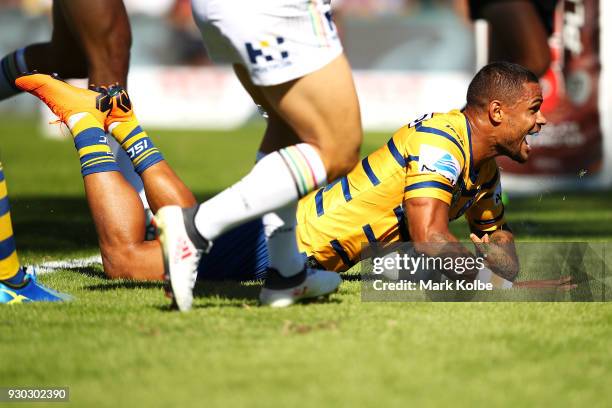 Josh Hoffman of the Eels celebrates scoring a try only to have it disallowed during the round one NRL match between the Penrith Panthers and the...