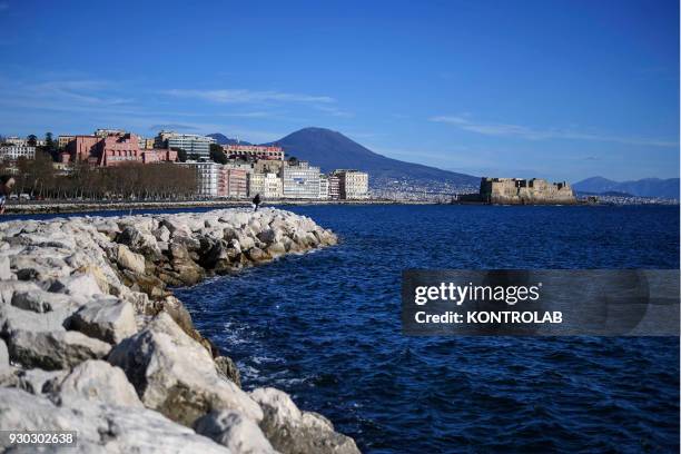 Panoramic view of Vesuvius and Castel dell' Ovo , from the Naples, in Campania region, southern Italy.