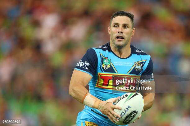 Michael Gordon of the Titans runs the ball during the round one NRL match between the Gold Coast Titans and the Canberra Raiders at Cbus Super...