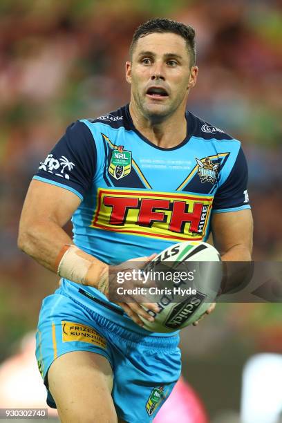 Michael Gordon of the Titans runs the ball during the round one NRL match between the Gold Coast Titans and the Canberra Raiders at Cbus Super...