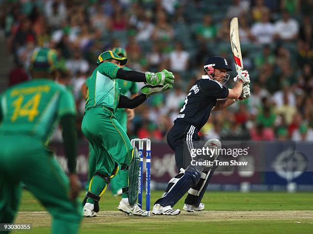 Paul Collingwood of England hits out during the Twenty20 International match between South Africa and England at the Wanderers on November 13, 2009...