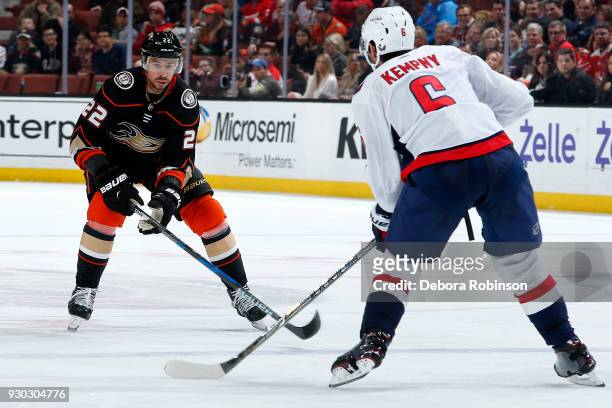 Chris Kelly of the Anaheim Ducks puts pressure on Michal Kempny of the Washington Capitals during the game on March 6, 2018 at Honda Center in...