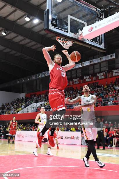 Alex Kirk of the Alvark Tokyo dunks during the B.League game between Alvark Tokyo and Sun Rockers Shibuya at Arena Tachikawa Tachihi on March 11,...
