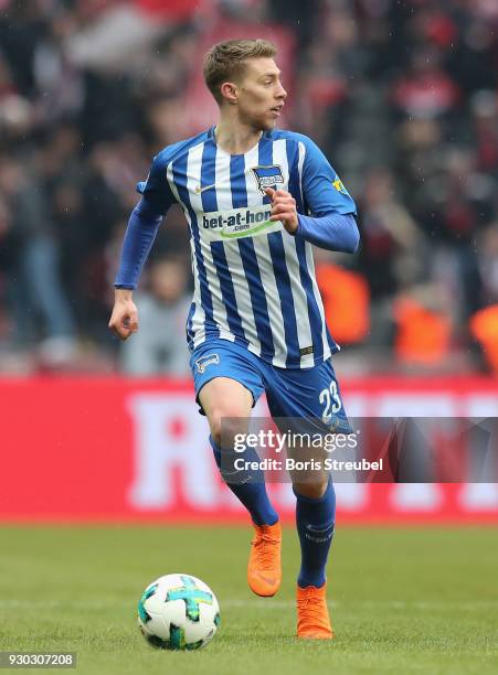 Mitchell Weiser of Hertha BSC runs with the ball during the Bundesliga match between Hertha BSC and Sport-Club Freiburg at Olympiastadion on March...