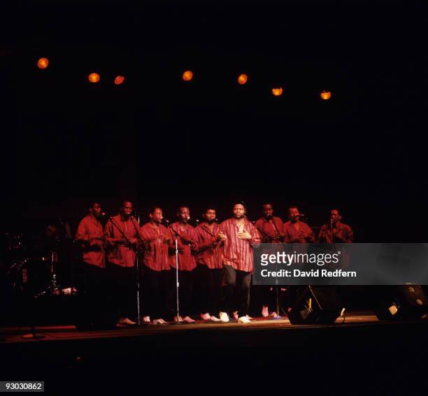 South African group Ladysmith Black Mambazo perform on stage at the New Orleans Jazz and Heritage Festival in New Orleans, Louisiana on May 05, 1990.